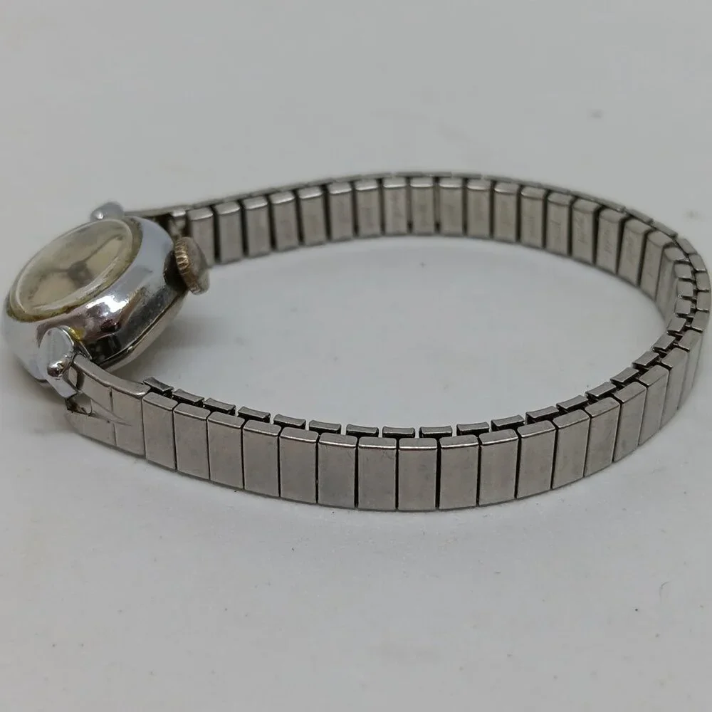 VINTAGE Timex Manual Wind Women's 17 mm Silver Tone Cocktail Flex Band Watch